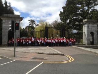 Tyndall based UCC staff campaigning outside the main gates of UCC